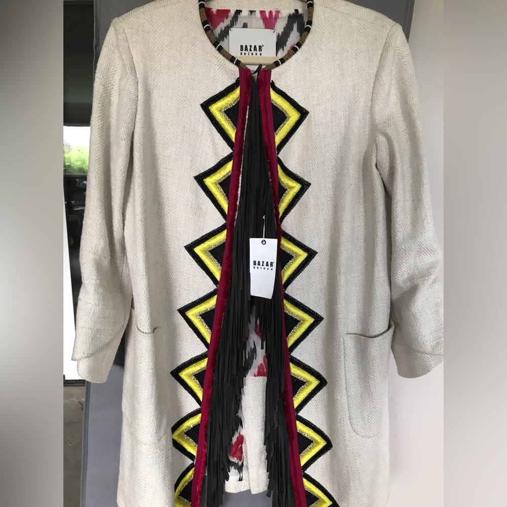 Bazar Deluxe jacket with fringe! Never worn, excellent condition, cream/colors.